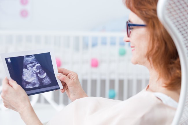 Patient is happy looking at the sonography reports